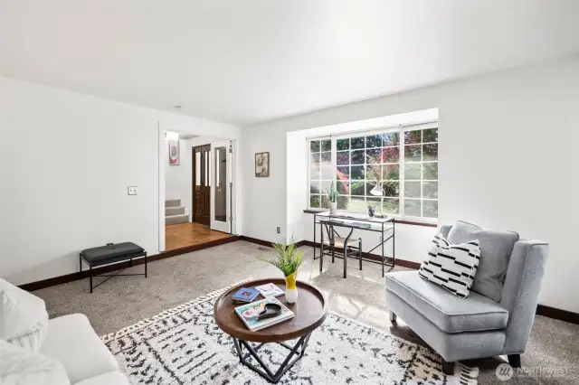 This living space is on the front of the house and faces West.