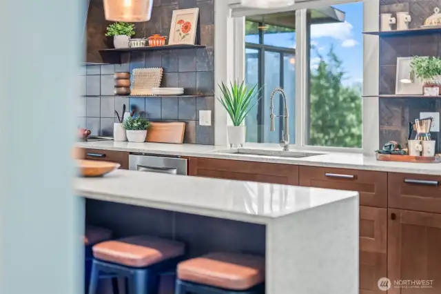 This kitchen was renovated by a local architect with custom materials throughout.