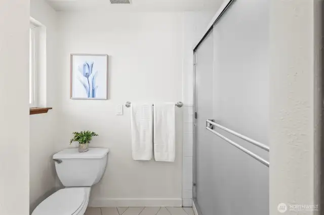 In addition to the soaking tub, there's a large shower in this bath.