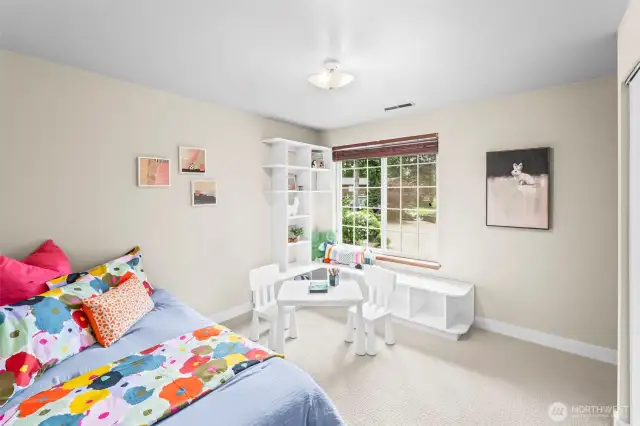 Third upstairs bedroom also has some built in shelves (closet is to the right in this photo).