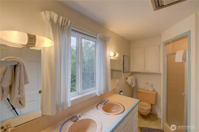 Primary full bath with bathtub and stand alone shower.