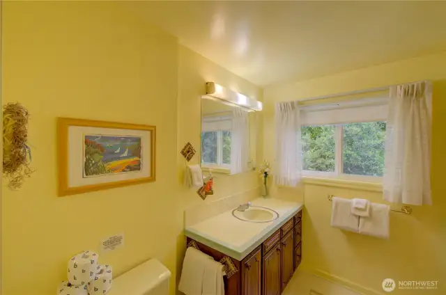 Upstairs bath with walk in shower.