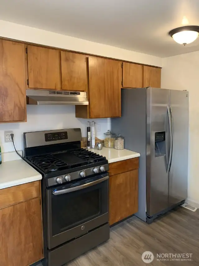 Lots of cupboards for your groceries and kitchen supplies. The chef will appreciate the gas stove.