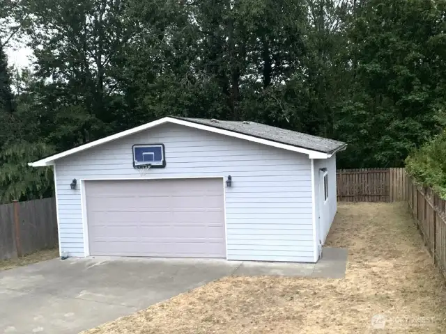 Looking at this fabulous, rare to West Seattle, huge 30' wide, 28' deep, detached garage with 220 power! RV parking too. The extra spacious driveway is a great place to practice your basketball moves too. Or draw some chalk art, hopscotch, tricycle riding. Of course you can use it to park on too.