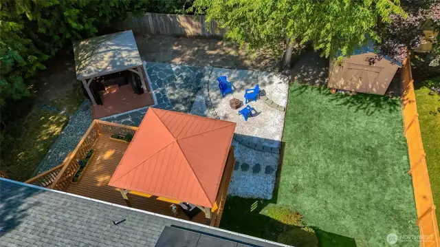view of back yard and both gazebos