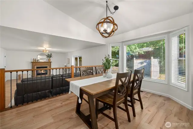 From the wonderful dining perfect for hosting, step down into the family room.