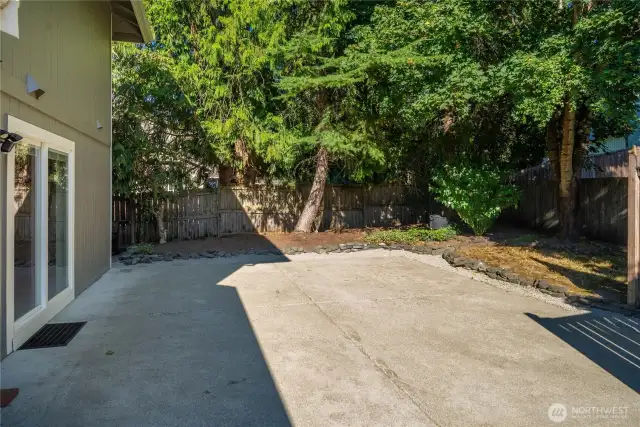 Spacious back patio is great to set up the grill or patio furniture!