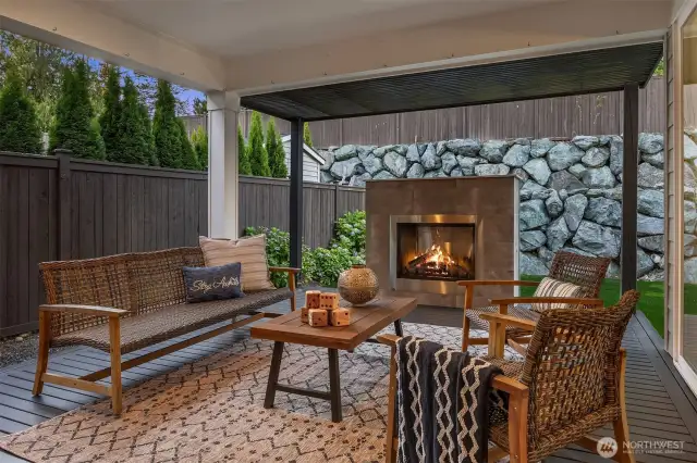 You can see the extended overhang to protect the fireplace, another add-on. Outdoor privacy and enjoyment year round.
