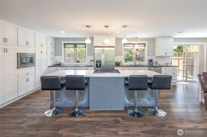 Huge island with breakfast bar. New SS appliances too!
