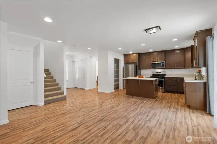Plenty of storage under the stairs via the door on the left. Also easy access to the crawlspace from inside the closet.