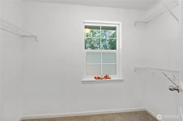 Closet for the Primary bedroom. Window to the front for good light in the room.