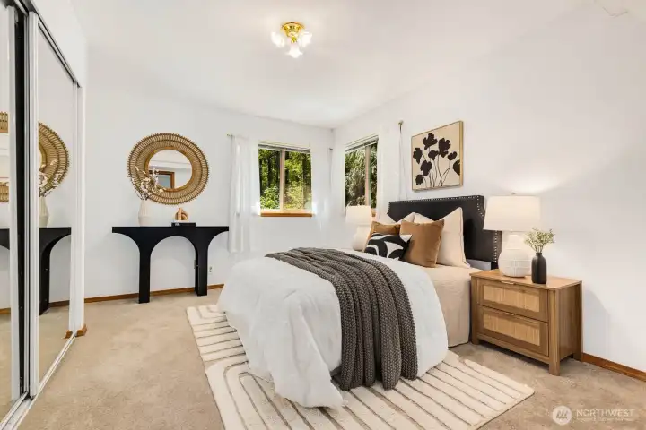 Guest bed #1, with large mirrored closets and corner windows
