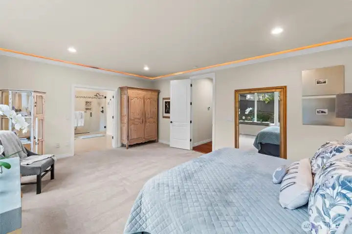 Primary suite layout with direct access to the spa-inspired bath and generous walk in closet.  This is main-floor living at its finest.
