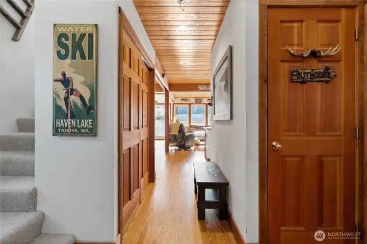 Entry, wood plank flooring throughout main level