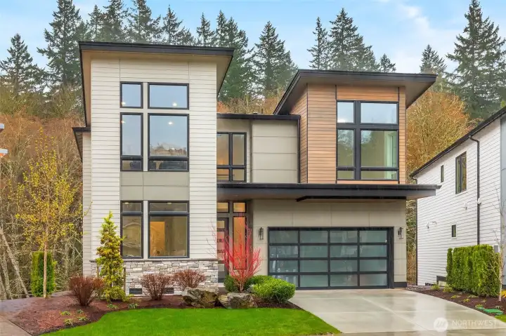 Each residence professionally designed Lanscaped yard maintained by HOA. Stunning NW Contemporary designs feature stained cedar and stone details, glass panel garage doors, and modern black windows