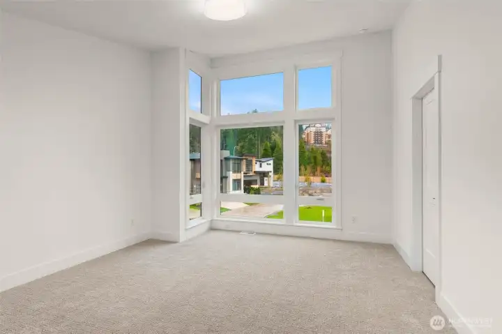 One of 3 spacious secondary bedrooms on the upper floor. Upper floor features 4 beds + rec room