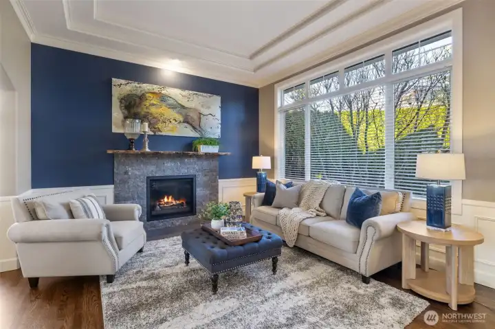 Formal living room with a gas fireplace.