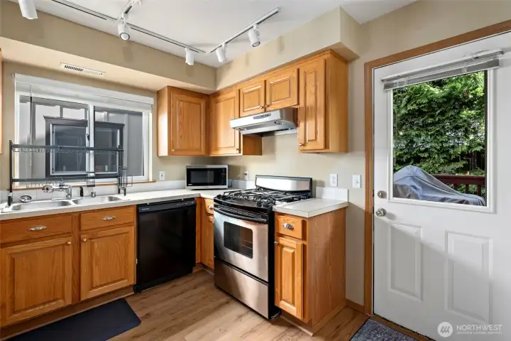 Kitchen with door to back deck.