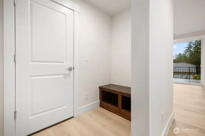 Convenient "mud room" off garage entry.