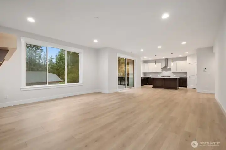 Spacious and open great room layout. Large sliding doors lead to deck and backyard