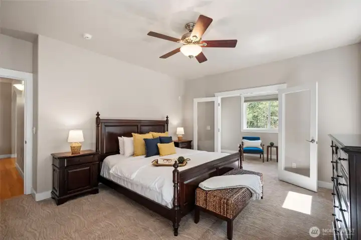 The Primary has two rooms, the main sleeping area and a sitting room with the fireplace.