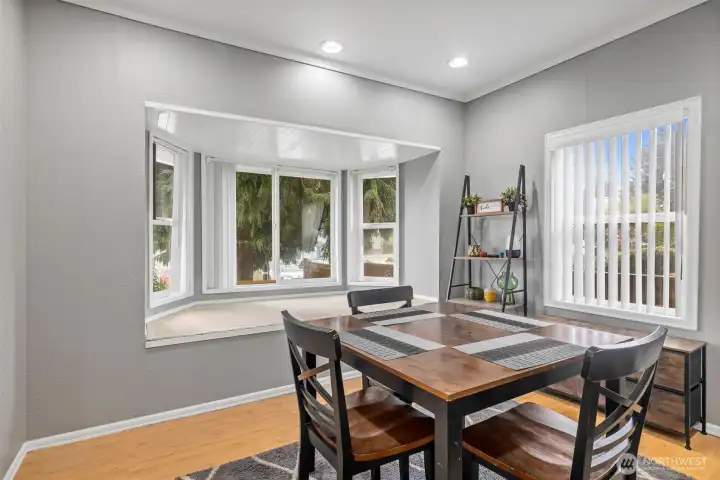 Dining room with cozy reading nook - perfect for everyday living or entertaining