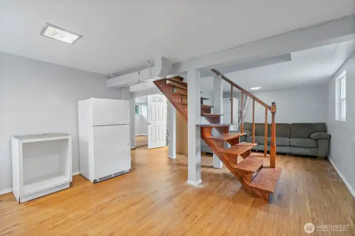 Lower level with ADU potential featuring option for separate entry and flexible living space.