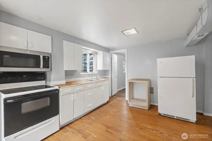 Lower-level kitchen ideal for MIL suite or potential rental setup