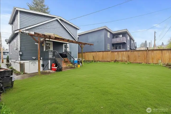 Expansive backyard with alley access—ideal for parking, outdoor use, or future development potential