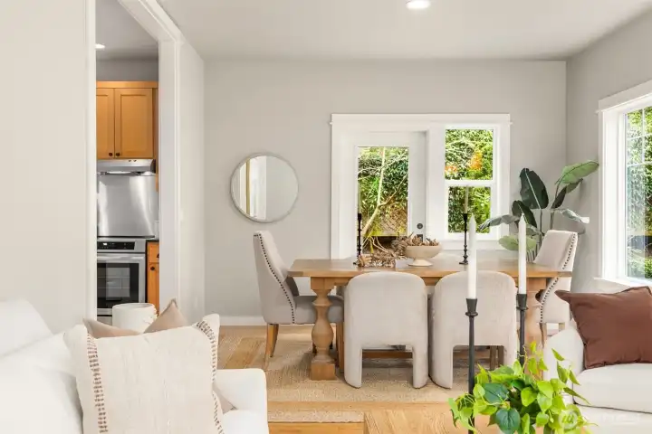 The dining space continues the narrative—intimate yet airy, where clean lines and natural light create an inviting setting for both everyday living and effortless entertaining.