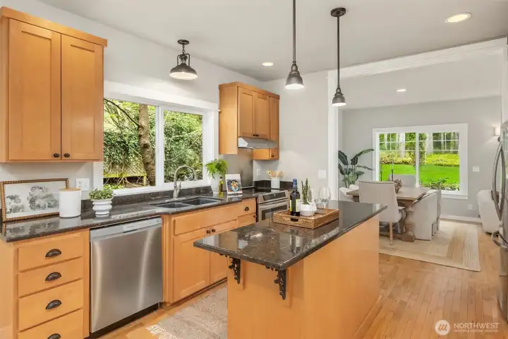 The kitchen opens naturally to the rest of the home—modern, functional, and connected to the rhythm of everyday life.