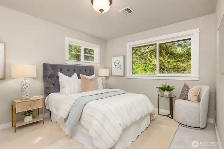 Three bedrooms upstairs offer comfort and flexibility—space for guests, work, or growing into.