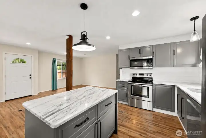 Large center island with countertop seating—ideal for entertaining