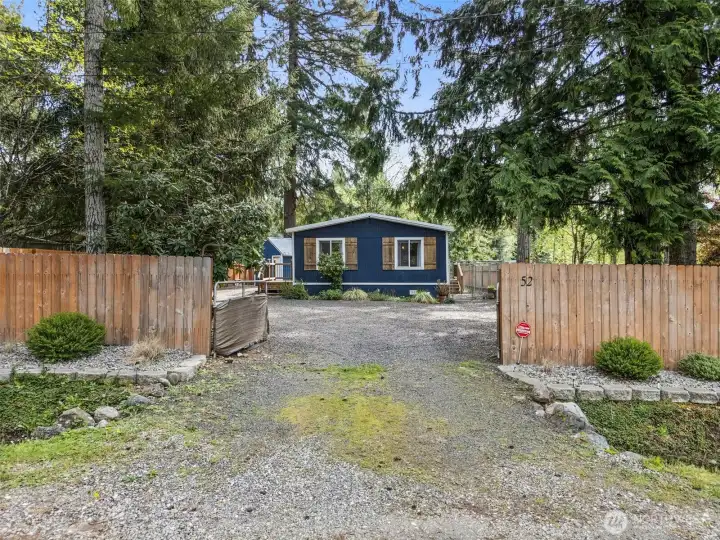Gated front entry with ample parking and privacy fence