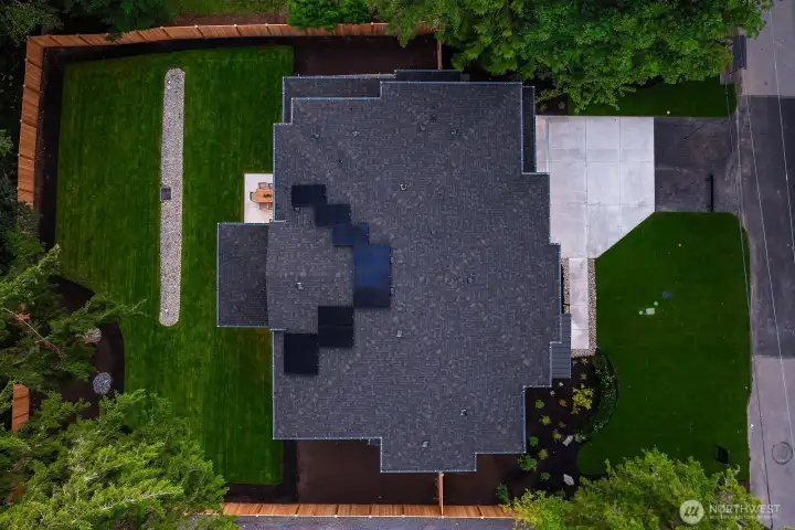 This home contains solar panels. The photo shown above is from a different MN Custom Home with a simiar solar array
