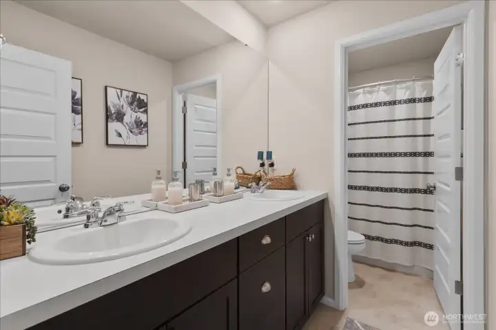 Upper level full bathroom. Upper level full bathroom.