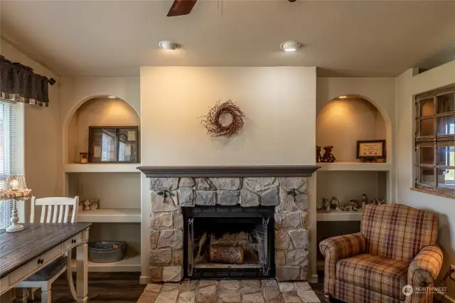 Stone fireplace surround with built-ins (wood burning fireplace)