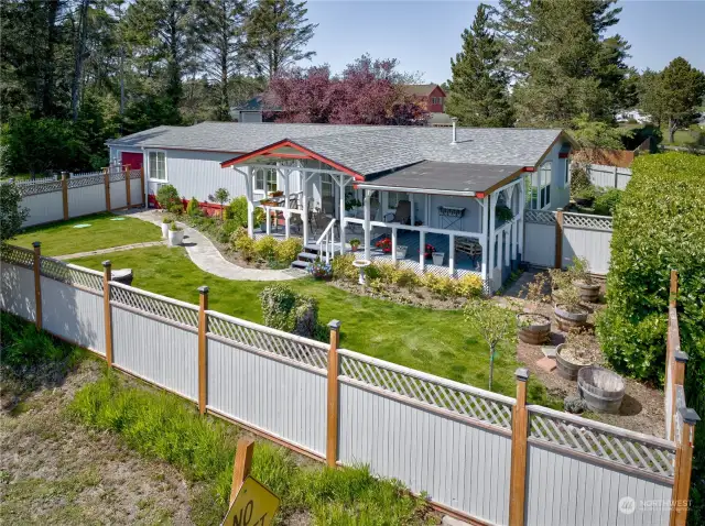 Wonderfully landscaped, fully fence front and back yards