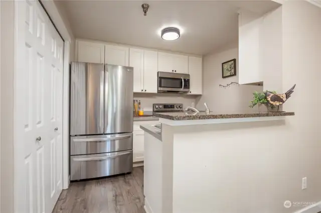 Updated kitchen has newer appliances and a large pantry