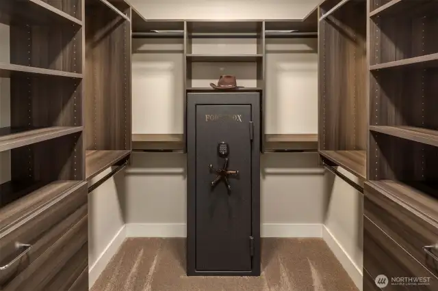 walk-in closet with safe.