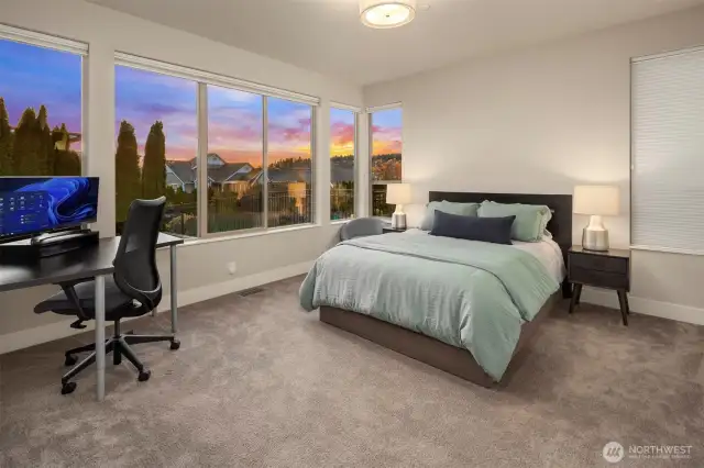 Ground floor west bedroom w/ en suite 3/4 bath & walk-in closet.