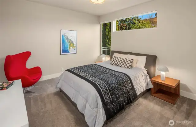 Ground floor south bedroom w/ ensuite full bath.