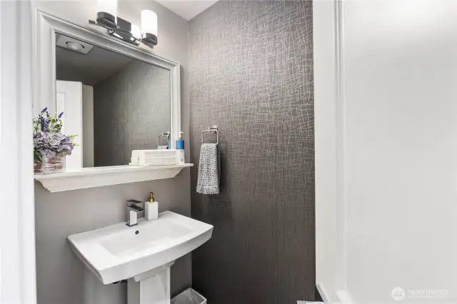 Powder room with designer wall paer