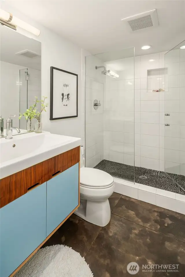 Three-quarter bathroom on LL. Again, radiant floor heat.