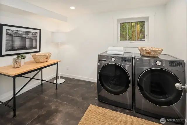 Lower level laundry room with plenty of space and a window too!