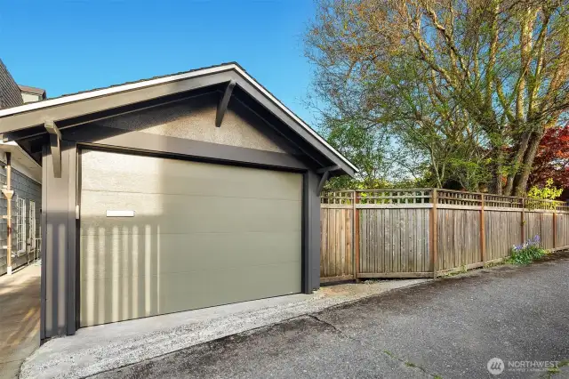 Level alley access to sizable one car garage with new elect sub panel