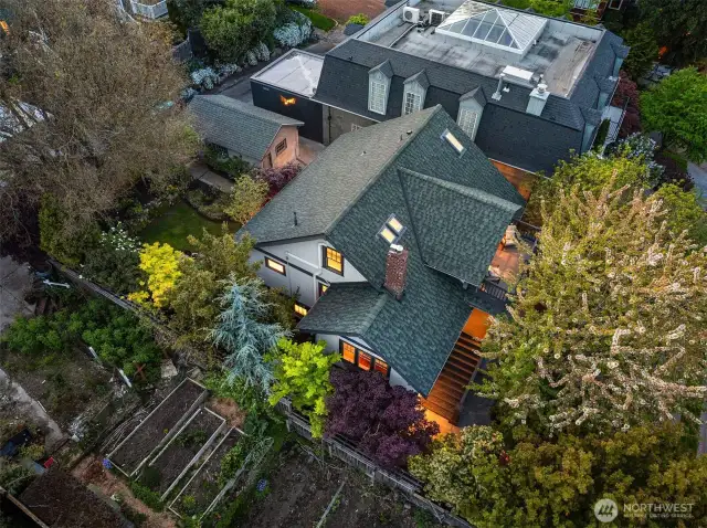 Note the garden area on the protected lot on the south side of the house. This is based on a covenant on that land that cannon be built upon. An amazing feature of this property.