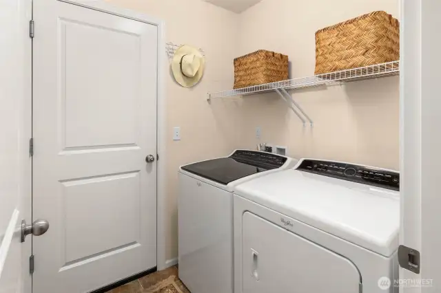 Ground floor laundry room leads through to the garage.