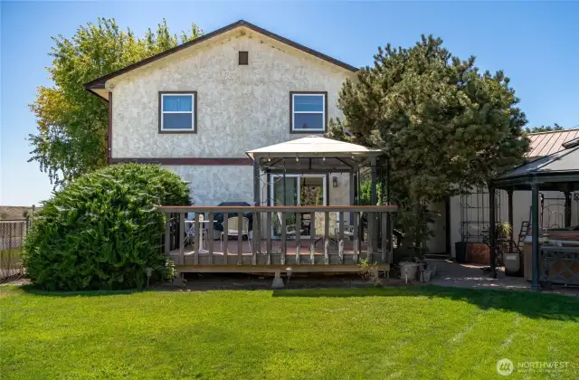 Side yard to the right of the house (fenced)