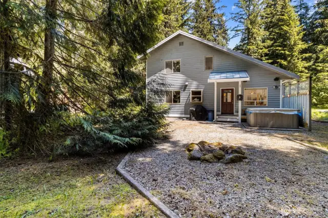 Backyard w/ Hot Tub, fire pit + storage shed